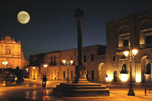 Muro Leccese old town main square with two churches by night